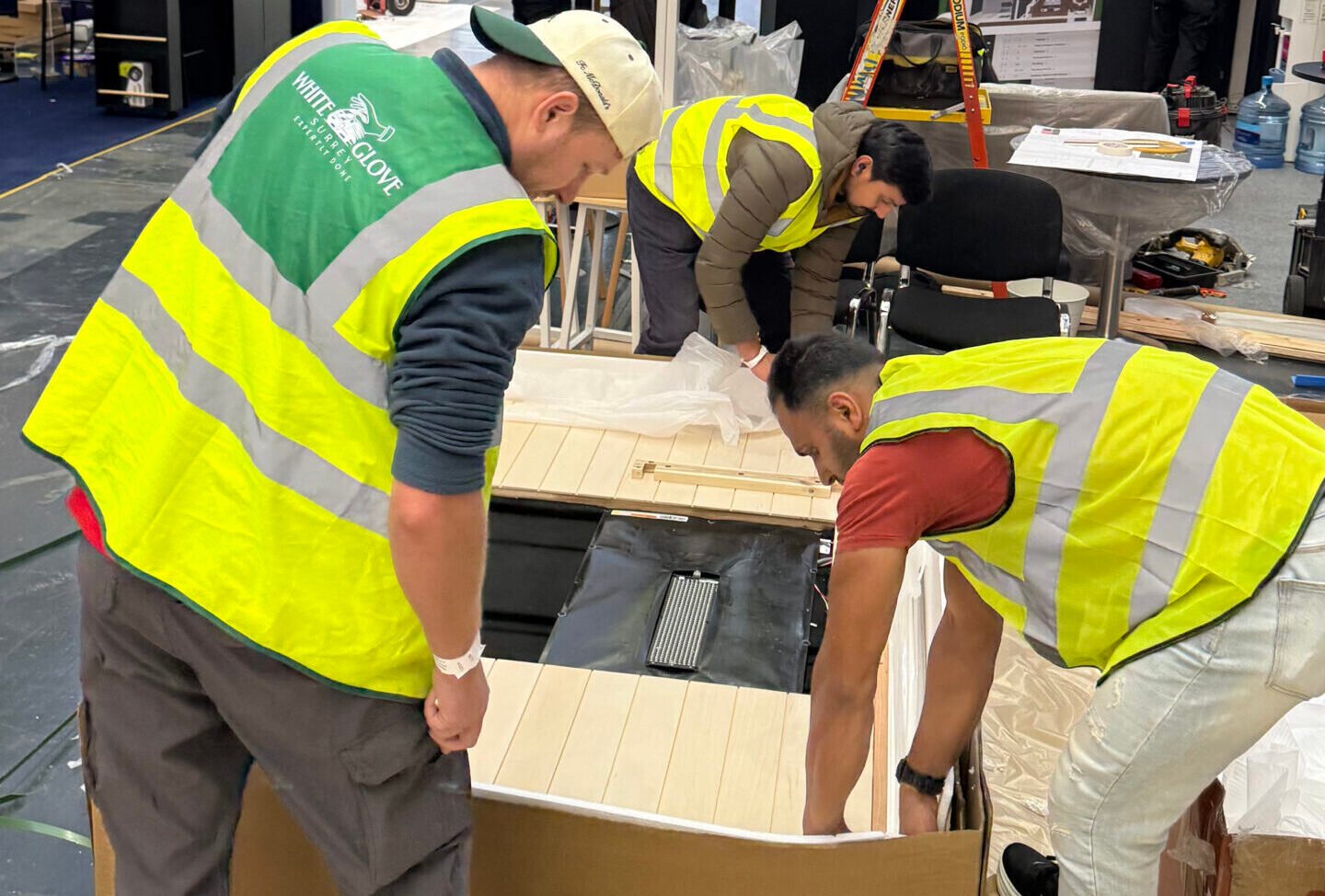 White Glove Surrey team lifting dismantled furniture panels